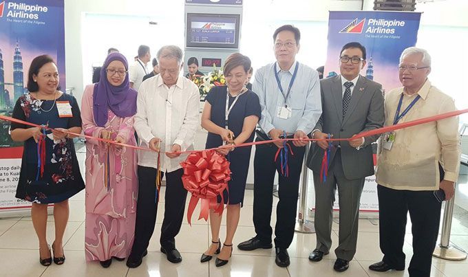 PAL KL flight ribbon cutting