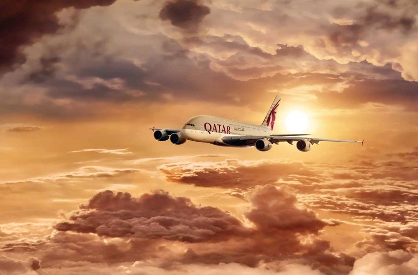 qatar airways sun clouds