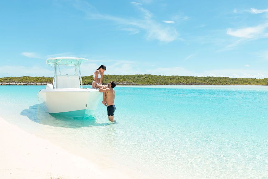 Rock Legend Lenny Kravitz Invites Travelers To The Bahamas 4 bahamas couple on the beach