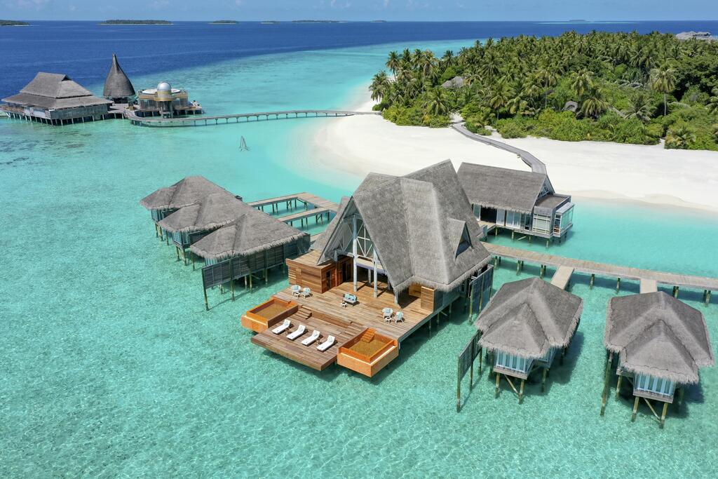 Anantara Kihavah Maldives over sea aerial