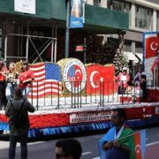 Turkish Day Parade in New York City with Turkish and American flags and Ataturk posters at the hands of people