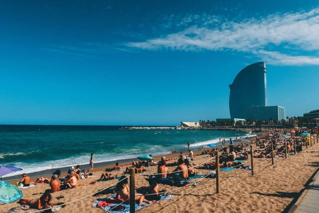 Barcelona beach, W Hotel and beach with beachgoers