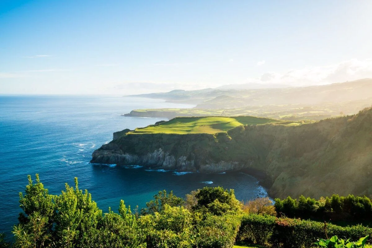 Best Places To Travel In Europe In August (2025 Edition) 6 Amazing view green cliff near sea Azores Archipelago in Portugal
