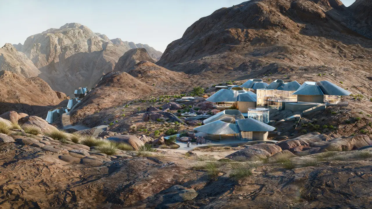 Ritz-Carlton Reserve in Trojena, Saudi Arabia, rendering view of the hotel on mountainous terrain.