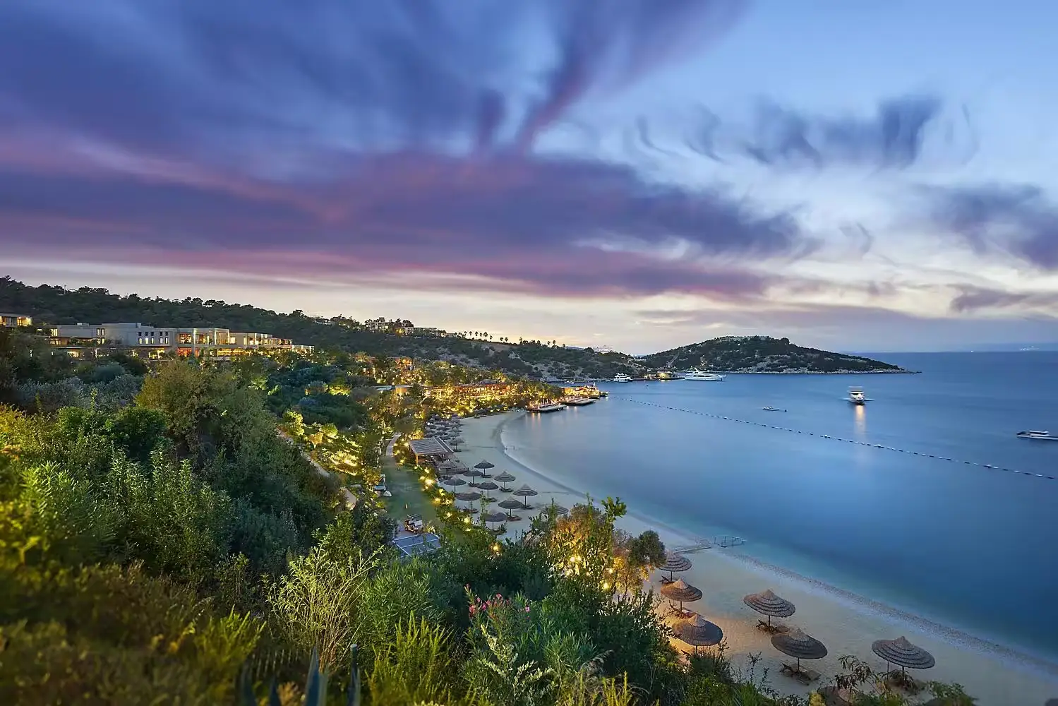 Mandarin Oriental, Bodrum exterior with the beach and sea view at dusk