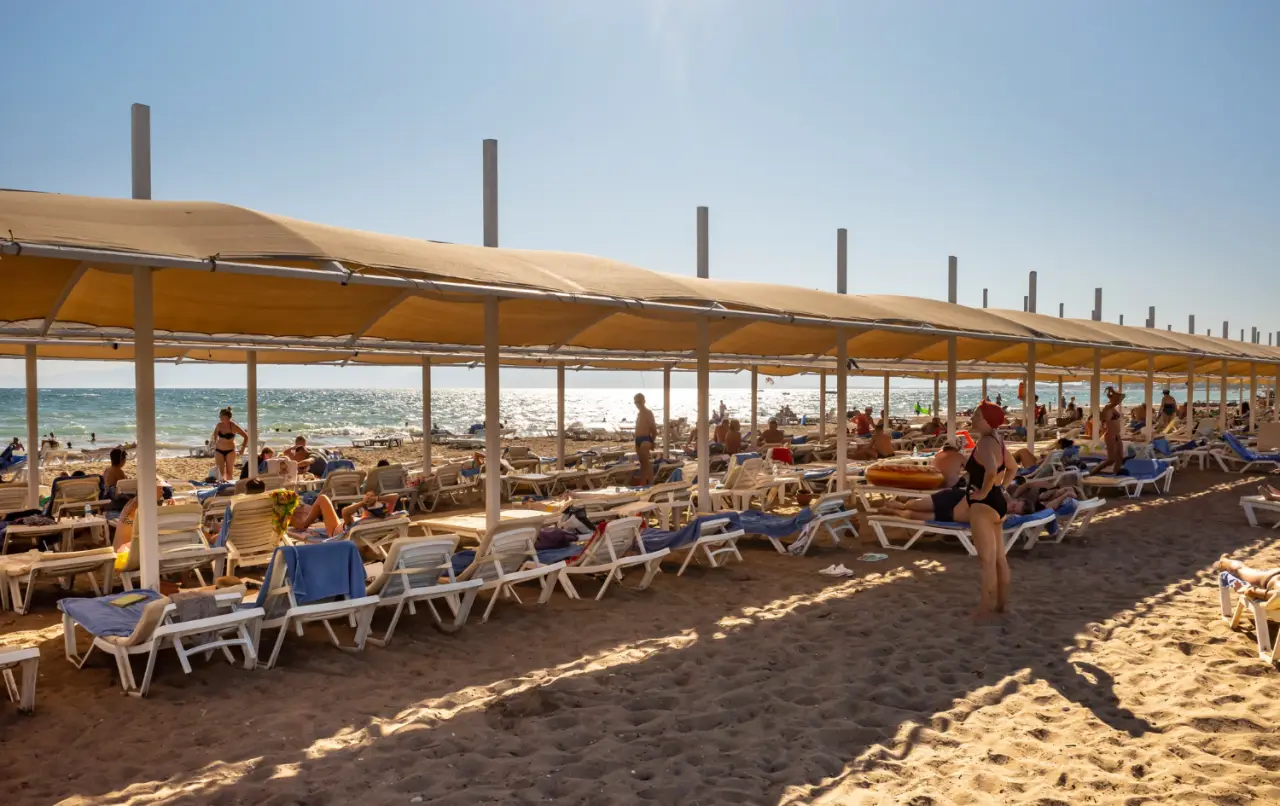 Tourist families enjoy sea sand sun in Belek Antalya Turkey