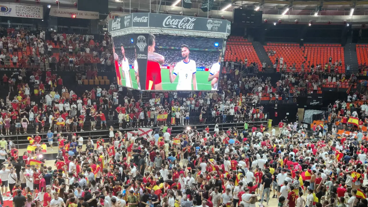 Valencia basketball arena displays Spain's Euro 2024 matches live on screen where football fans fill the stadium