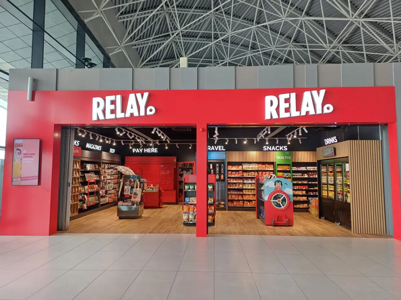 Relay airport stores featuring travel essentials, snacks, and local products.