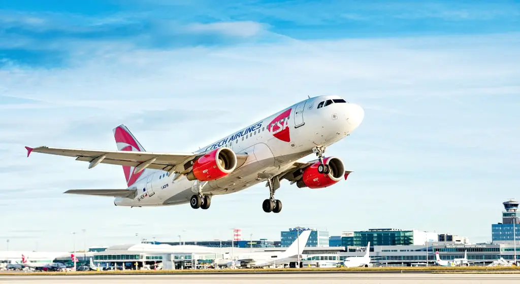 Czech Airlines To Cease Operations, Ending 23-Year Skyteam Partnership 2 Czech Airlines aircraft taking off from an airport, showcasing the airline’s red and white livery against a clear sky.
