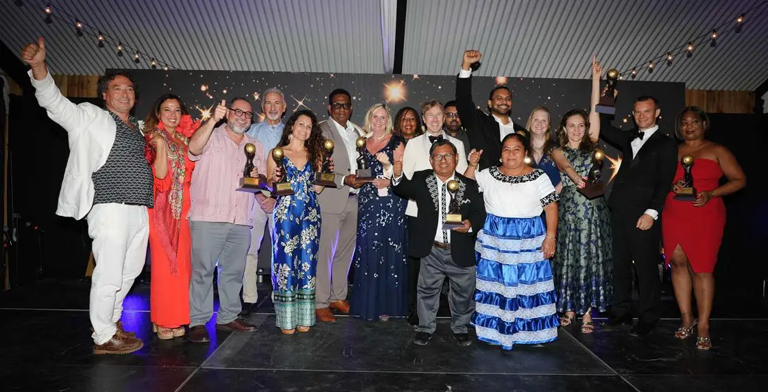 Group photo of the winners at the World Sustainable Travel & Hospitality Awards ceremony in Belize, celebrating their achievements in sustainable tourism.