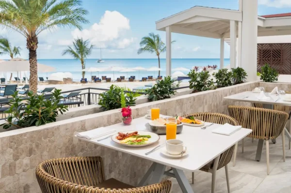 Dining at Royalton CHIC Antigua with ocean views—experience the best new all-inclusive resort in the Caribbean and Mexico.