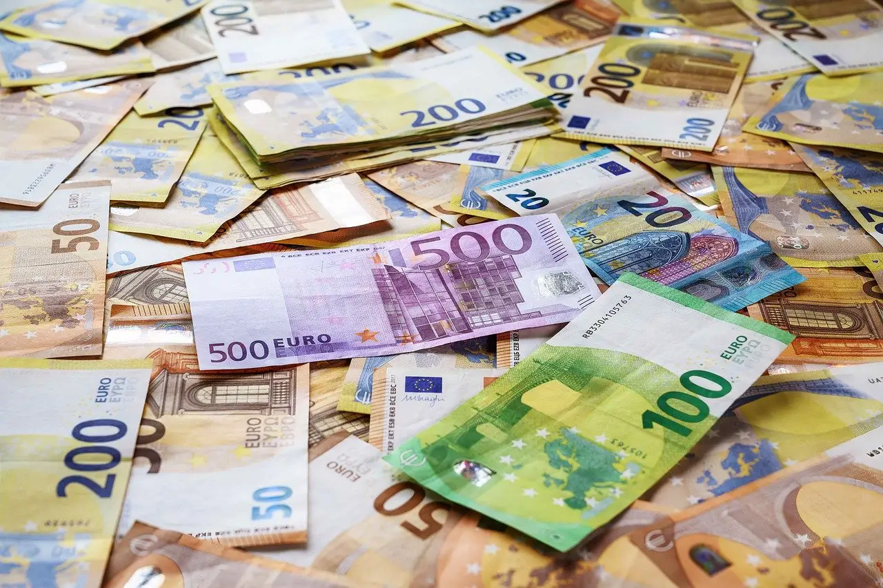 Pile of Euro banknotes in various denominations.