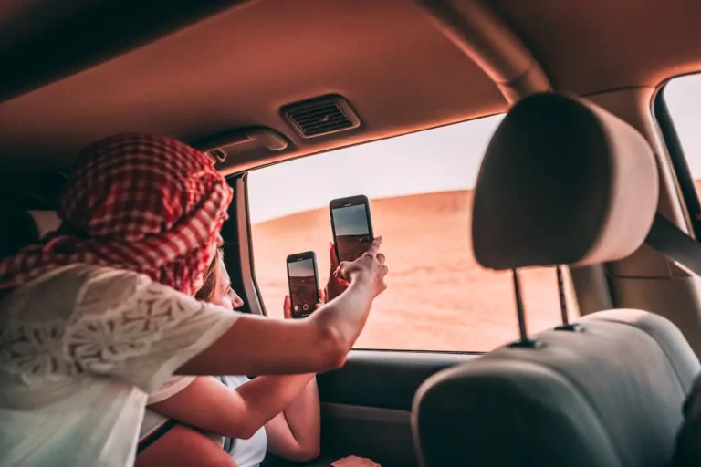 taking photos uae desert road trip