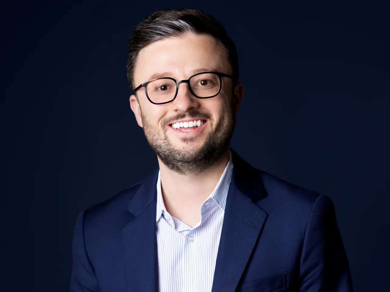 Tyler Gosnell, newly appointed Managing Director of International Inbound Travel at the U.S. Travel Association, smiling in a professional portrait.