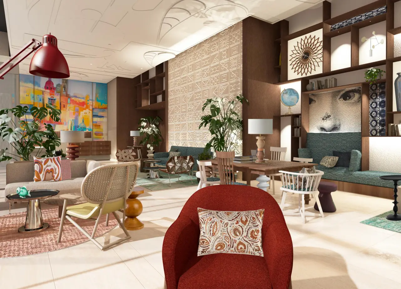 A modern hotel lobby with eclectic, vibrant decor, including colorful art, cozy seating, and warm lighting.