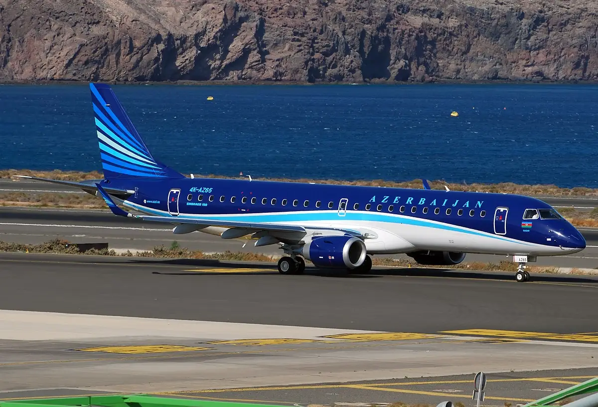 Azerbaijan Airlines Crash In Kazakhstan 4 Azerbaijan Airlines Embraer 190 aircraft taxiing on the runway near the coast.