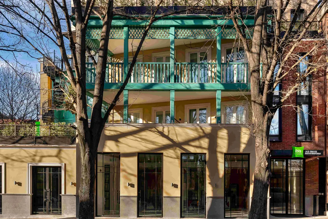 Exterior view of ibis Styles Old Tbilisi, showcasing its vibrant façade and balconies in the heart of Tbilisi’s historic district.