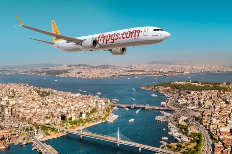 Pegasus Airlines Boeing 737-10 flying over Istanbul, showcasing the city skyline and Bosphorus Strait.