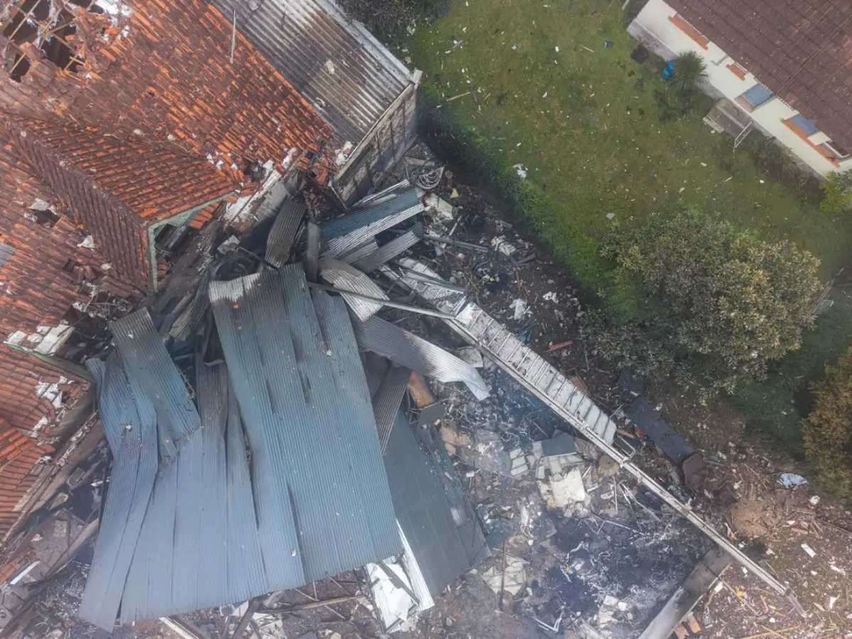 Aerial view of building wreckage after a plane crash in Gramado, Brazil.