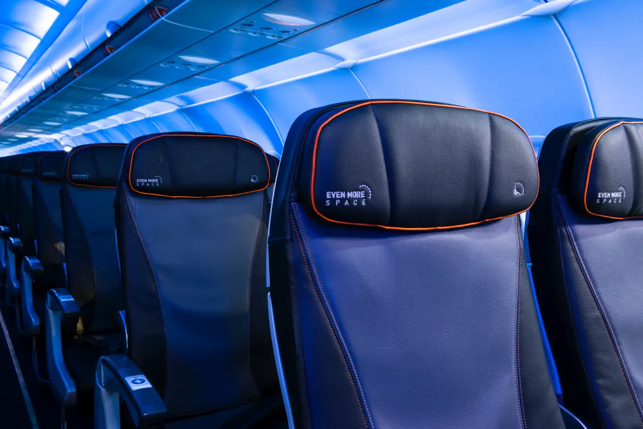 Even More Space seating onboard a JetBlue aircraft with enhanced legroom and premium features.