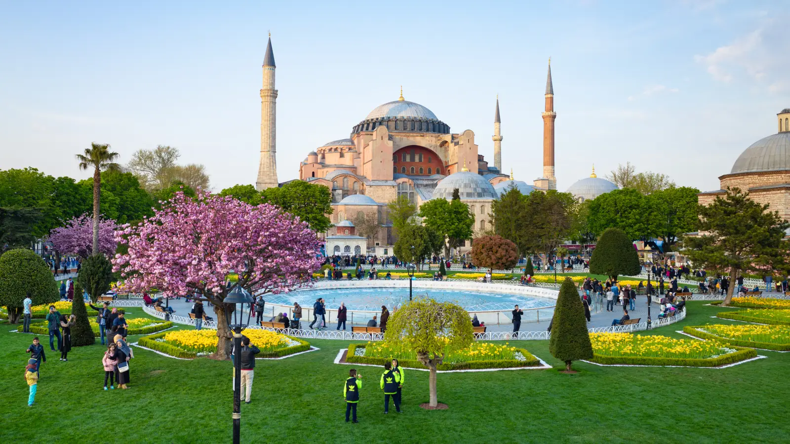 Hagia Sophia in Istanbul surrounded by gardens and springtime blooms.