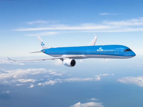 KLM Royal Dutch Airlines Airbus A350-1000 flying above the clouds.
