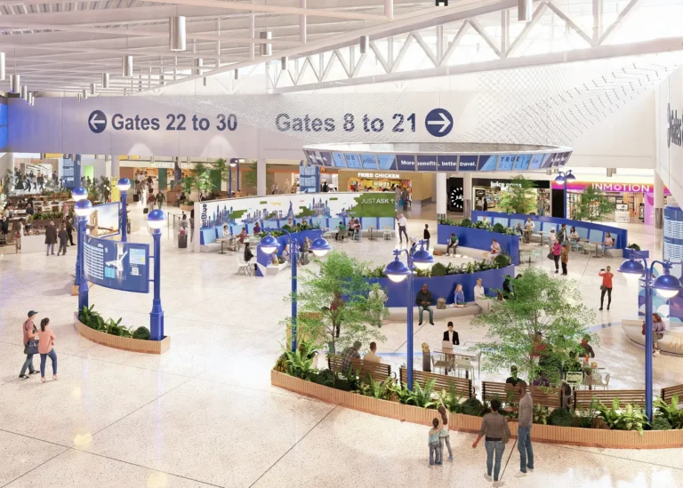 A rendered image of JFK Terminal 5’s redesigned center concourse featuring greenery, seating areas, and interactive spaces, inspired by New York’s iconic parks.
