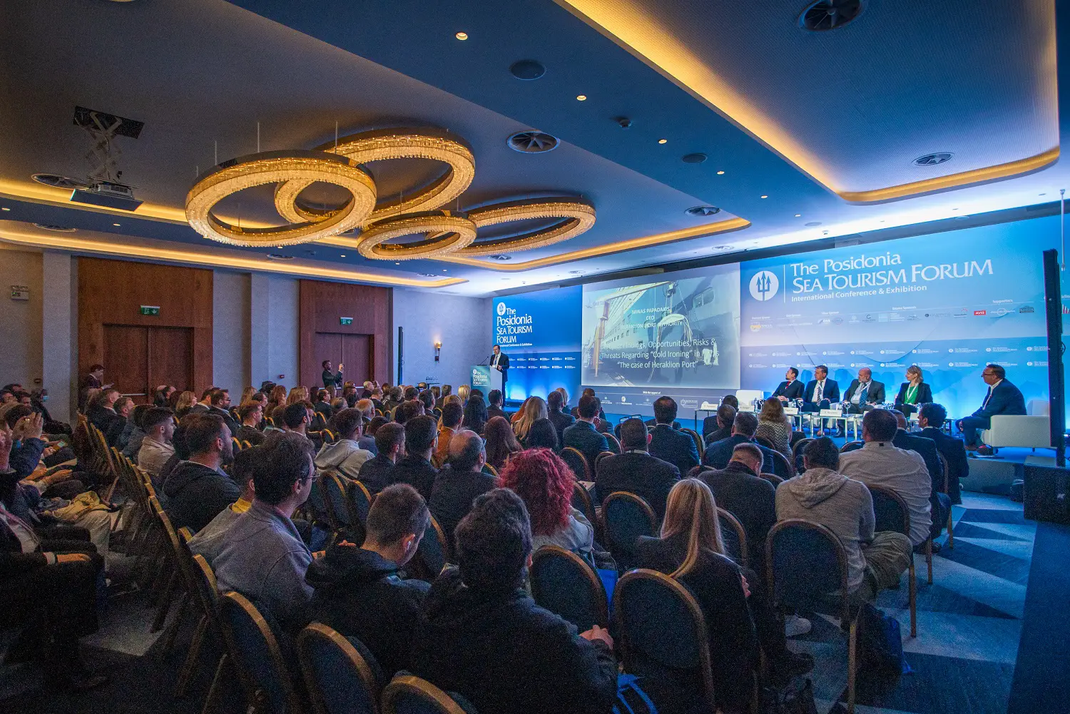 Panel discussion at the Posidonia Sea Tourism Forum, with cruise industry leaders addressing key topics in a packed conference hall in Heraklion, Crete.
