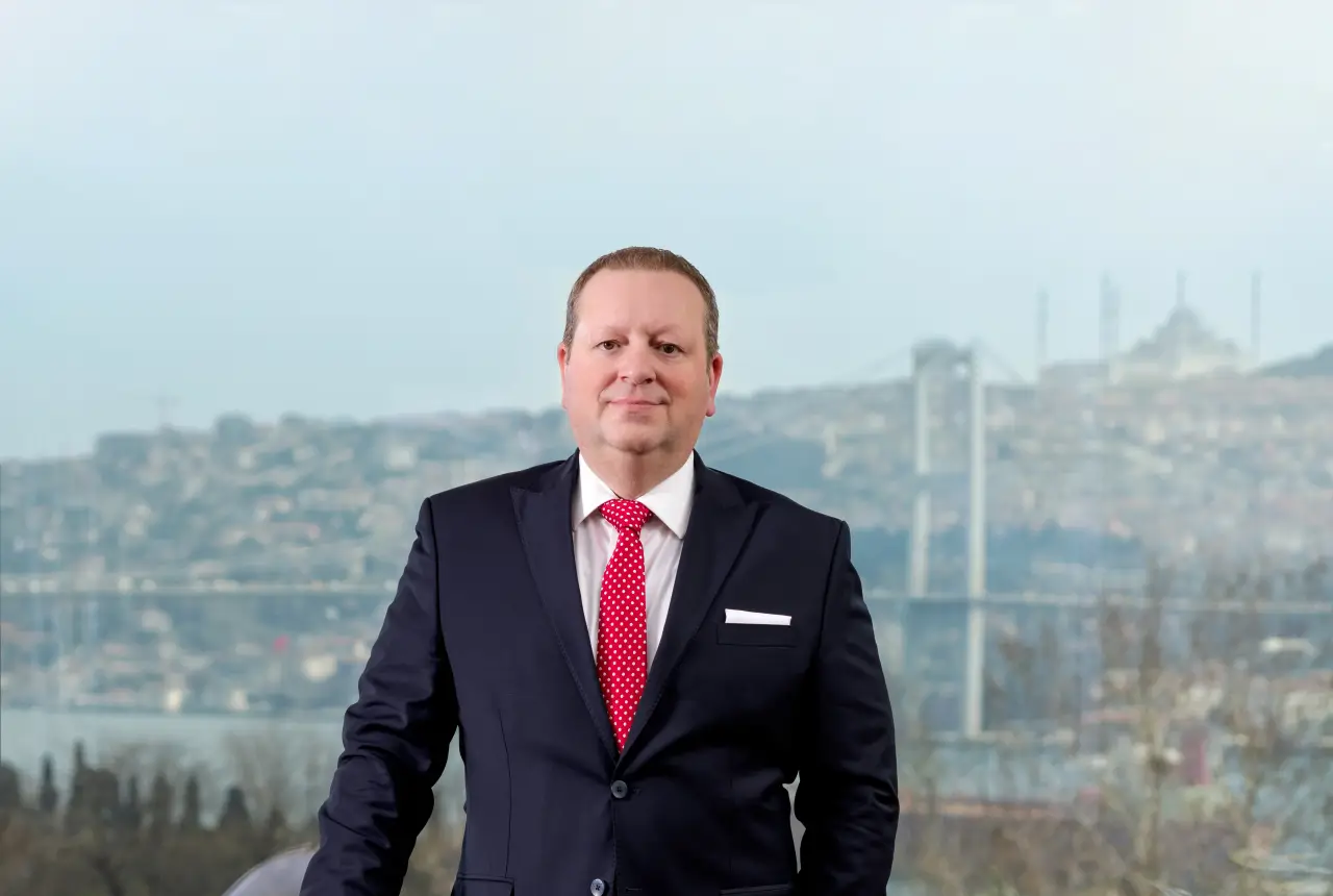 Rainer Gieringer, the new General Manager of Conrad Istanbul Bosphorus, posing with the Bosphorus Bridge in the background.