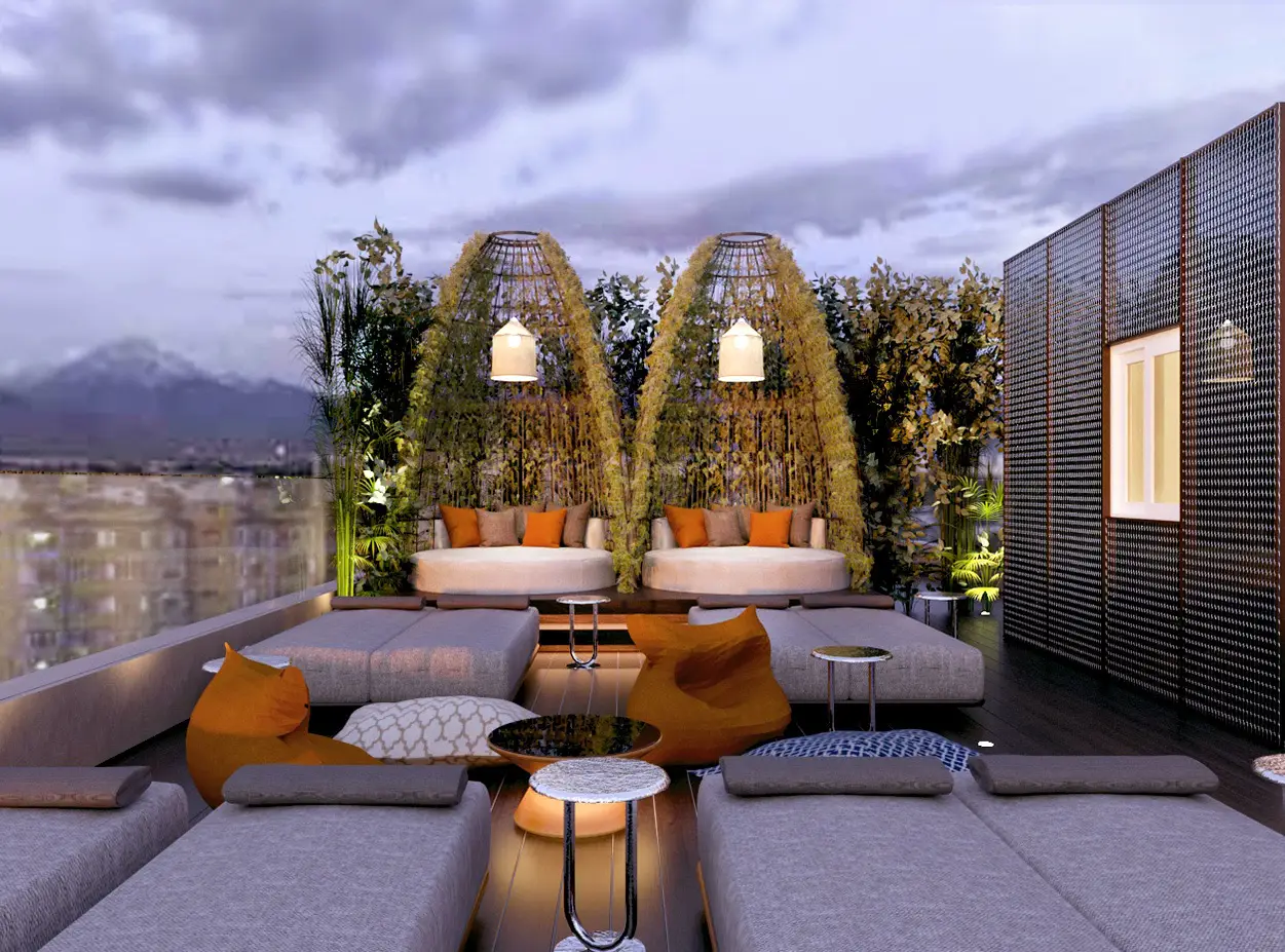 Luxurious rooftop lounge at Adia Aluma Athens, Curio Collection by Hilton, featuring cozy seating, hanging lanterns, and lush greenery with city views.