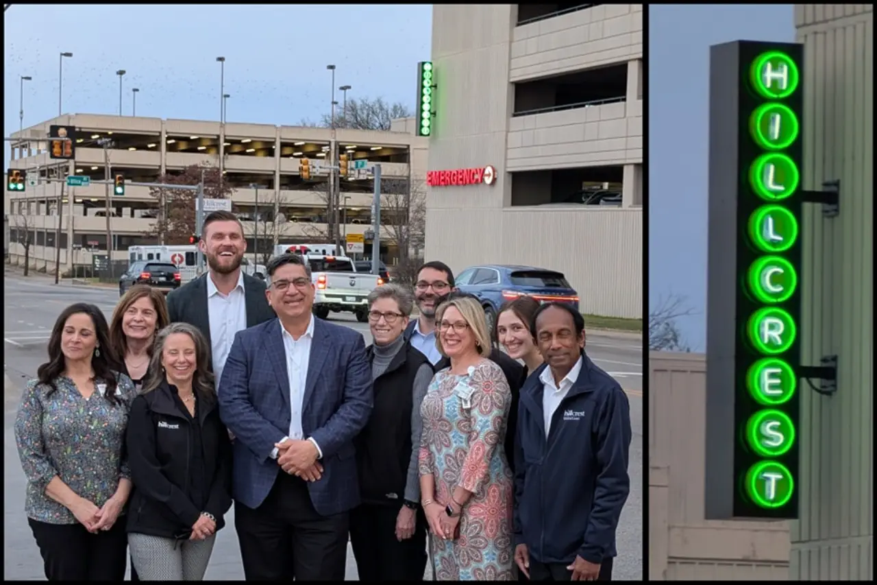 Tulsa’s Route 66 Reaches Milestone With 66Th Neon Sign Grant 2 Group of people standing in front of Hillcrest Medical Center with a newly installed green neon sign on Route 66 in Tulsa, Oklahoma. A close-up of the neon sign is shown on the right.