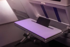 air nz Premium Economy bi fold tray table with device holder