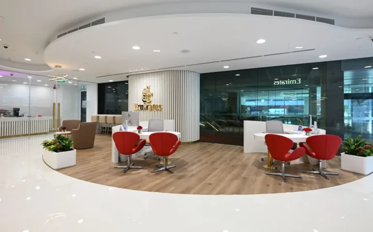 Emirates World retail store interior in Singapore with modern seating and customer service desks