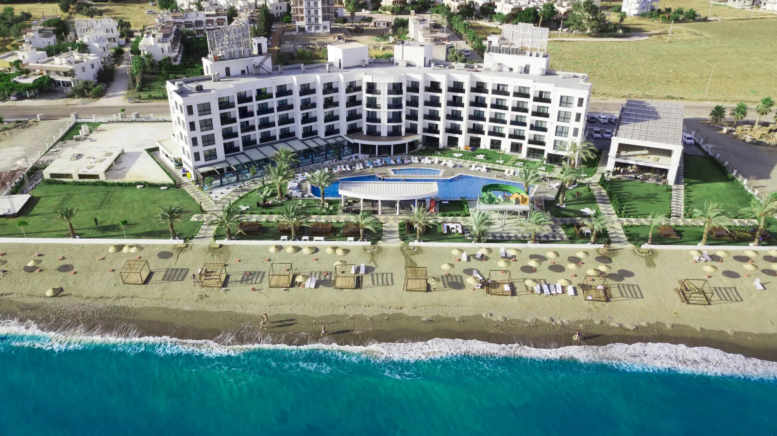 New Elite World Resort Brings Luxury To Mersin Silifke 14 Elite World Resort Mersin Silifke beachfront aerial view with pool and private cabanas