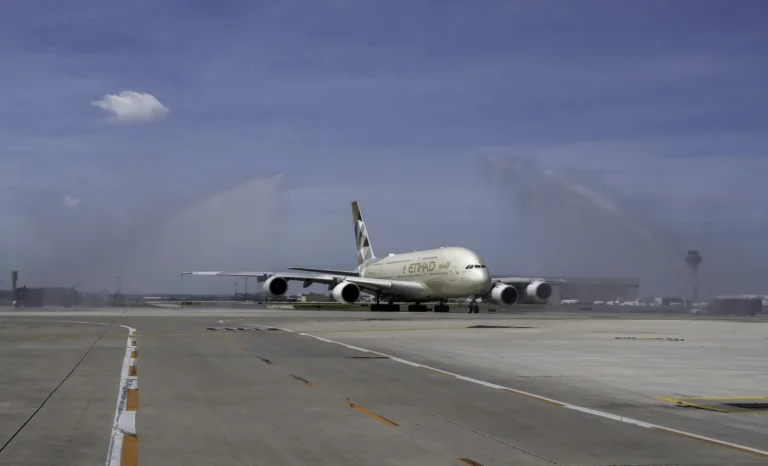 Luxury Travel 21 Etihad Airways Airbus A380 receiving water cannon salute on airport runway