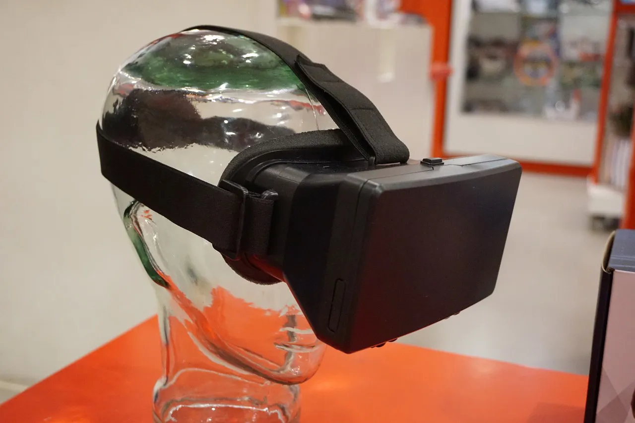 The Rise And Fall Of Location-Based Vr 2 Virtual reality headset on a transparent mannequin head in a tech display