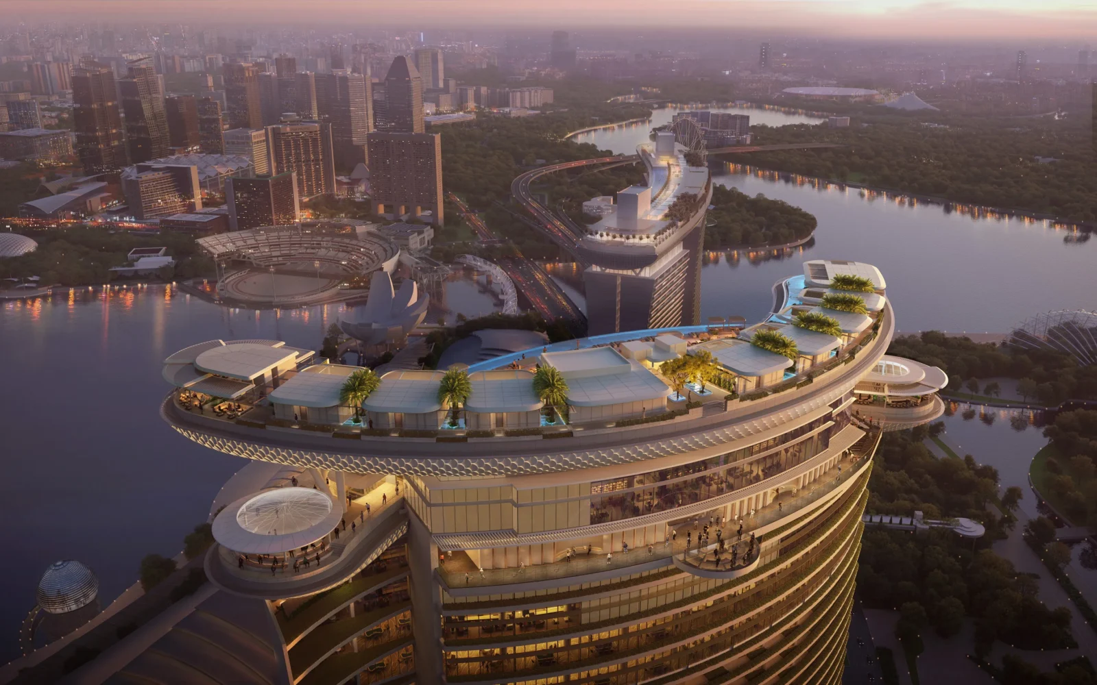 Close-up aerial view of the Skyloop rooftop atop the new Marina Bay Sands tower at sunset