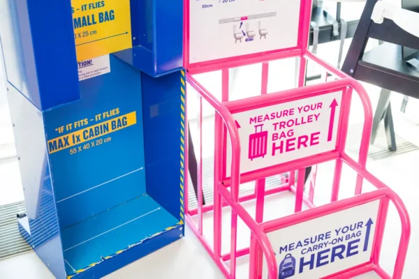 Cabin baggage sizers for Ryanair and Wizz Air showing allowed hand luggage dimensions.