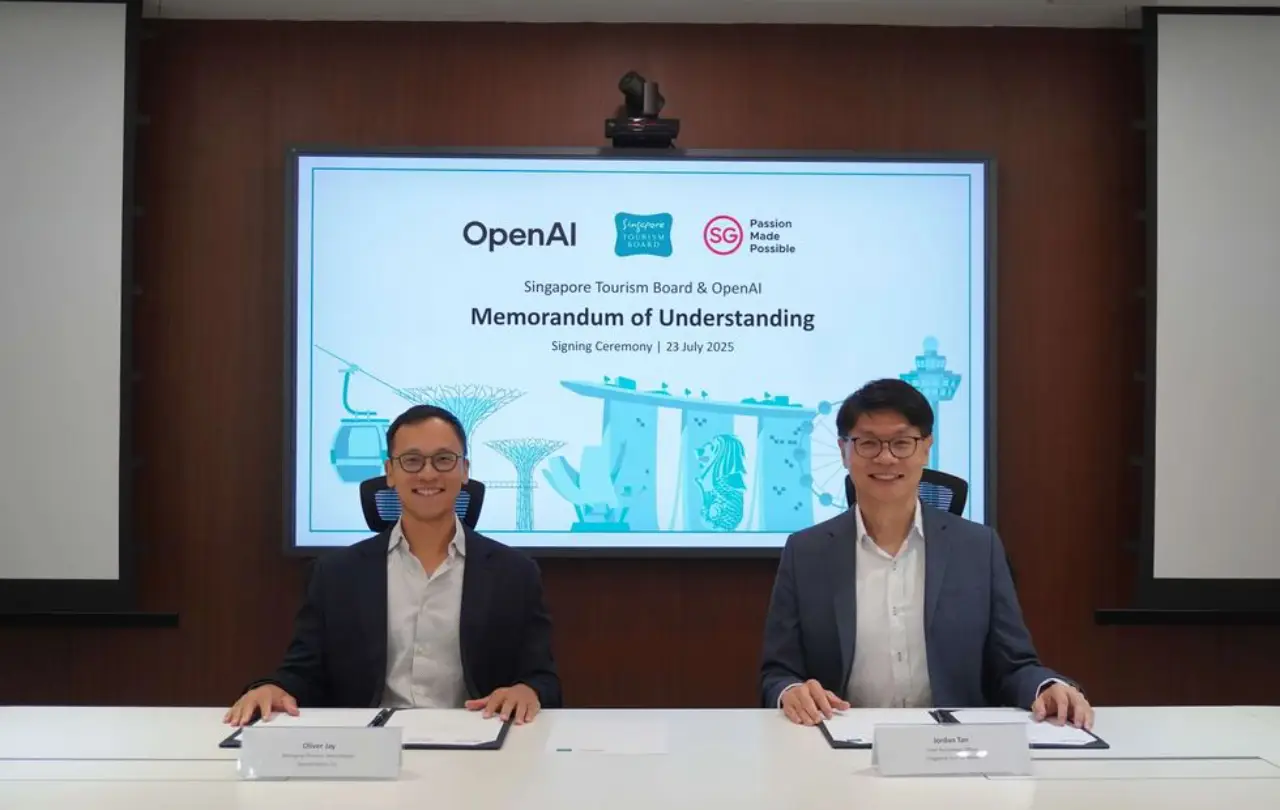 Singapore Tourism Board and OpenAI executives sign a Memorandum of Understanding on July 23, 2025, to advance AI-driven tourism innovation.