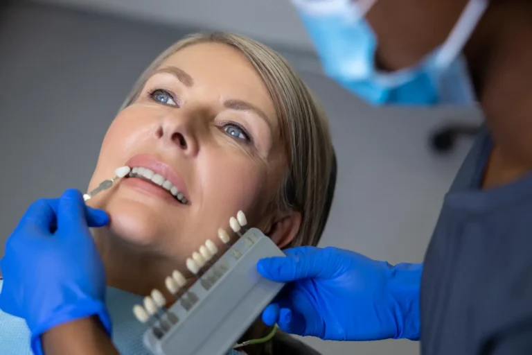 Dental tourism in Morocco, patient receiving veneer shade matching during cosmetic procedure