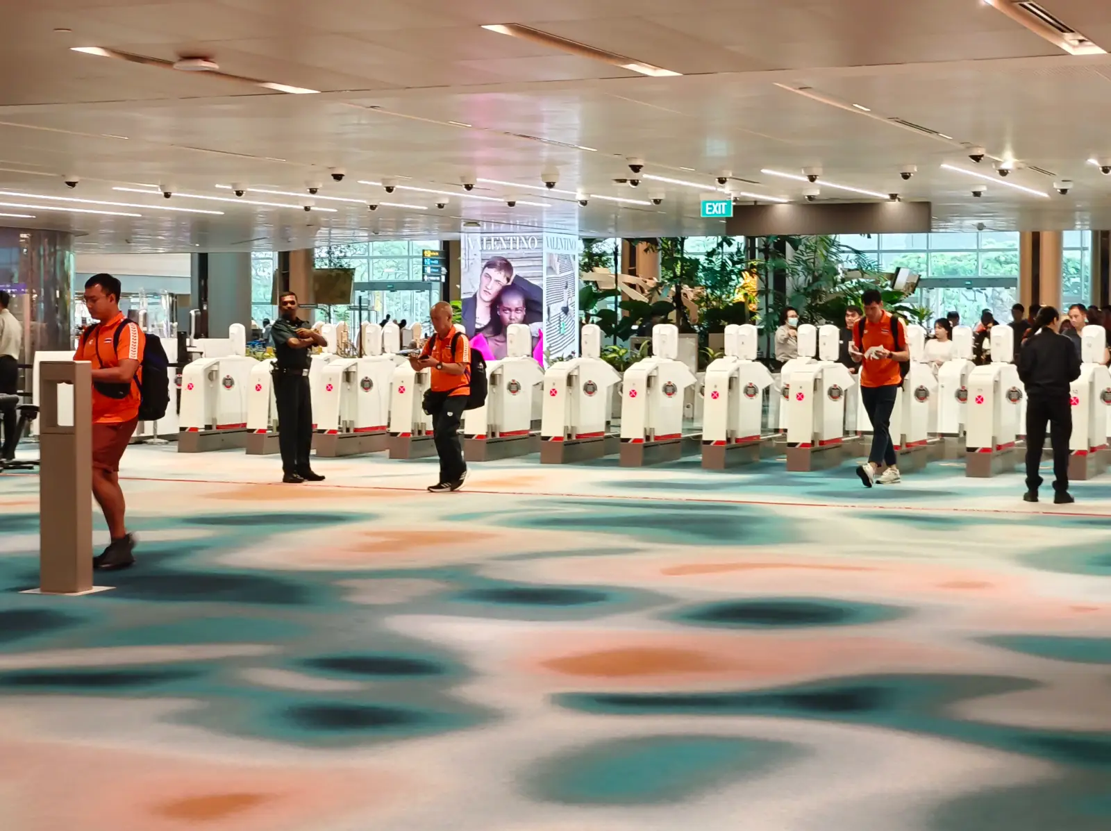 Immigration kiosk fingerprint clearance Changi Airport Singapore