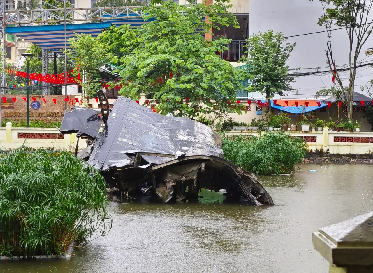 Vietnamese Military Exhibits Are Educational, Also Serve As Stark But Significant Reminders Of The Atrocities Of War 24 Wreckage of a U.S. B-52 bomber submerged in Hanoi’s B-52 Lake, a Vietnam War relic