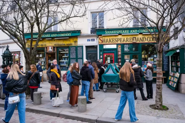 Home 26 Tourists gathered outside Shakespeare and Company bookstore in Paris, a literary landmark once visited by Hemingway, Pound, Fitzgerald, Stein, and Joyce