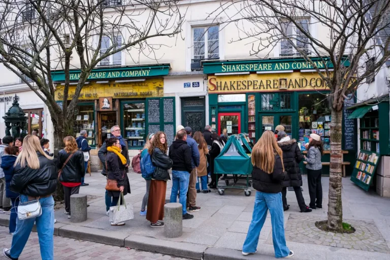 Tourists gathered outside Shakespeare and Company bookstore in Paris, a literary landmark once visited by Hemingway, Pound, Fitzgerald, Stein, and Joyce