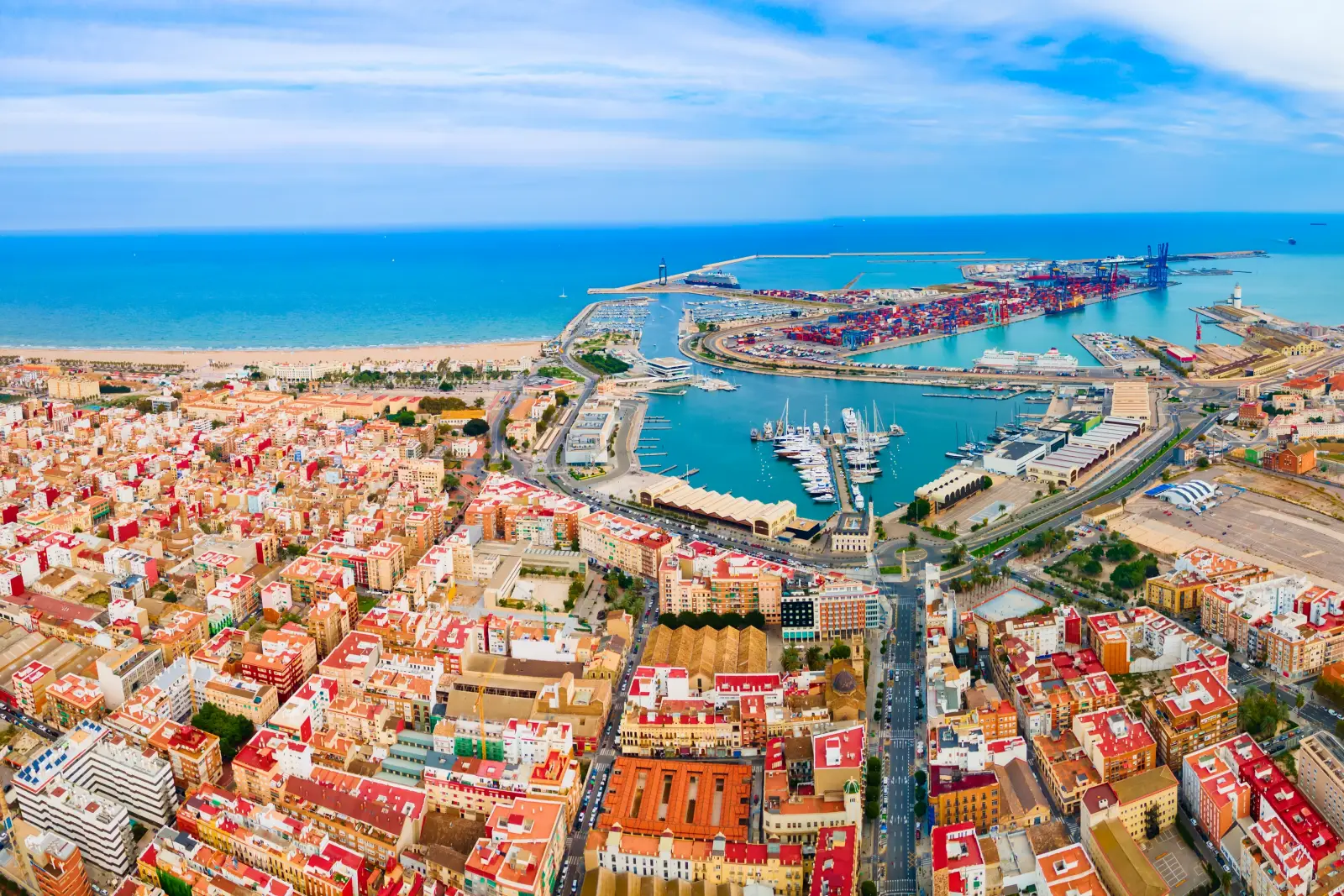 Aerial view of Valencia, Spain, showing the city, marina, port, and Mediterranean coastline