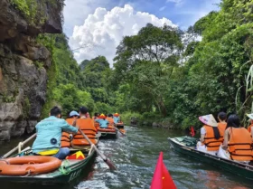 3b. Rowers at narrow part of river