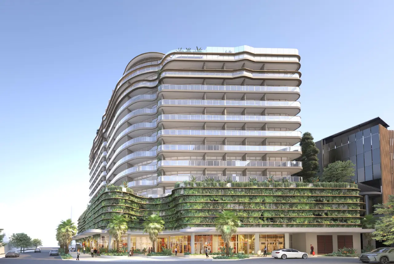Exterior rendering of the upcoming Avani Mooloolaba Beach Hotel with modern design and green facade.