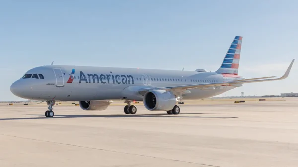 American Airlines Airbus A321XLR aircraft on the runway under clear sky
