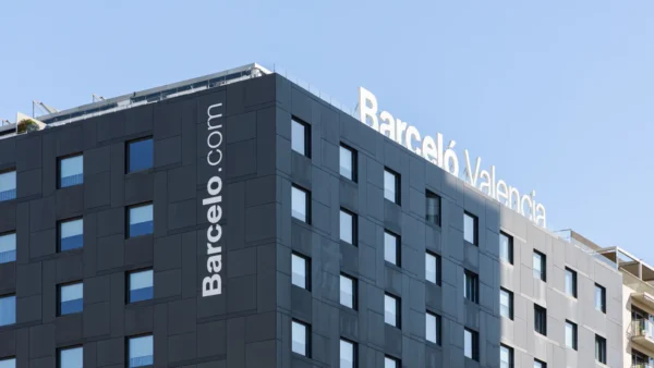 Barceló Valencia hotel exterior with logo signage on the building facade.