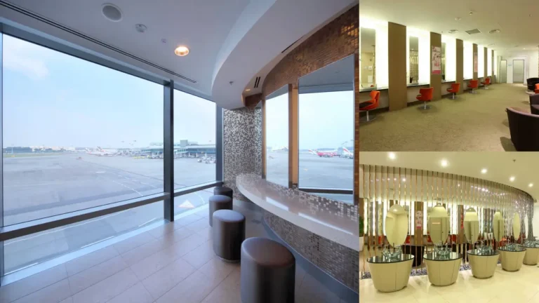 Elegant women’s washroom at Singapore Changi Airport featuring panoramic runway views, designer mirrors, and modern seating areas.